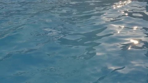 Top view of the water in the swimming pool. Abstract blue background Stock Footage 82221053