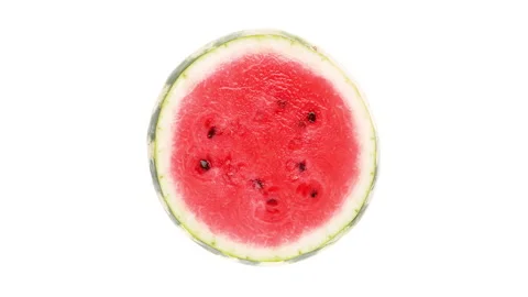 Top view of watermelon cross section cut rotating on white background. Stock Footage 160145409
