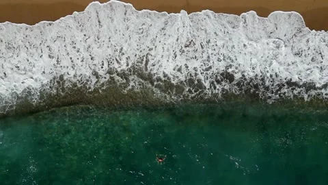 Top view wave crash on sandy beach Stock Footage 229457902