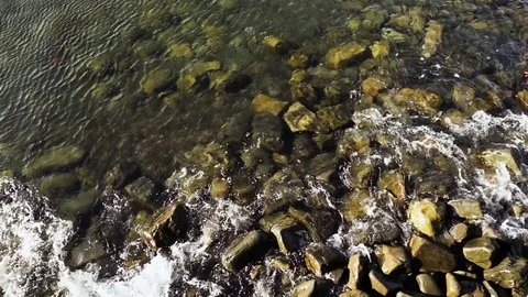 Top view of the wave on the rocks Stock Footage 82448761