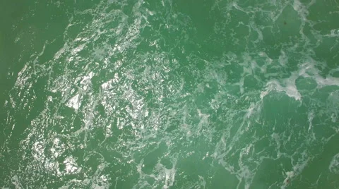 Top view of the waves and deep oceanic water. 4K Ultra HD real time video. Stock Footage 54725210