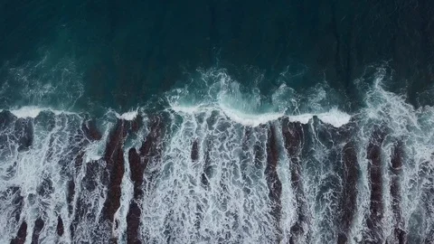 Top view of the waves breaking over a shallow reef Stock Footage 111487885