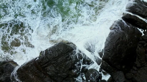 Top view waves crashing against rocks and cliffs , large ocean beautiful wave Stock Footage 256113486