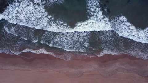 Top view of waves crashing at the beach. Stock Footage 258296690