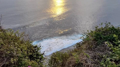 Top view of waves rolling one by one to the beach Stock Footage 117460952