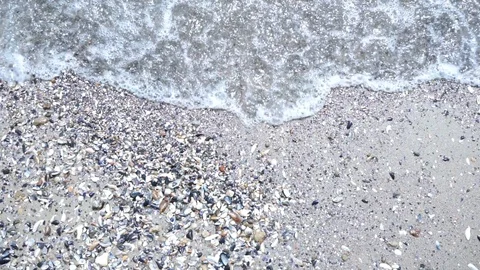Top view waves on sand beach Stock Footage 107866304