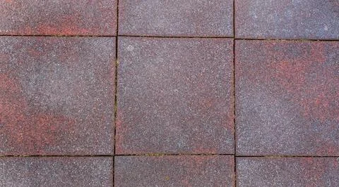 Top View Of Weathered Reddish Brown Rubber Paving Tiles Pattern Stock Photos