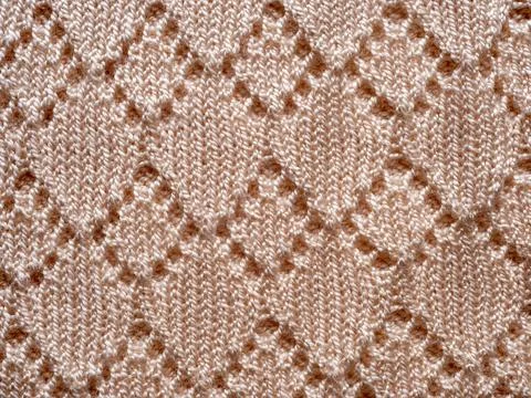 Top view weave patterned surface beige knitted wool fabric closeup texture ba Stock Photos