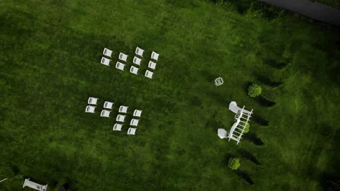 Top view of the wedding arch in a green field. Wedding ceremony with a decor  Stock Footage 169482673