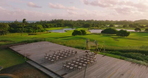 Top view of the wedding arch in a green field. Wedding ceremony with a decor on 動画素材 200021316