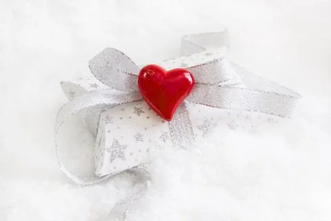 Top view of white and silver present box with red heart for christmas Stock Photos