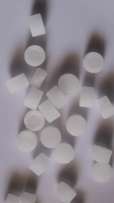Top view of white camphor tablets Видео 330658079
