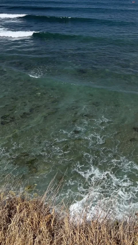 Top view of white caps of waves on the blue-green sea background Stock Footage 283546960