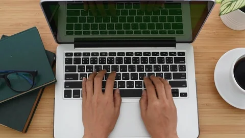 Top view of white desk with office supplies. woman using his laptop computer, ty 库存影片 87447835