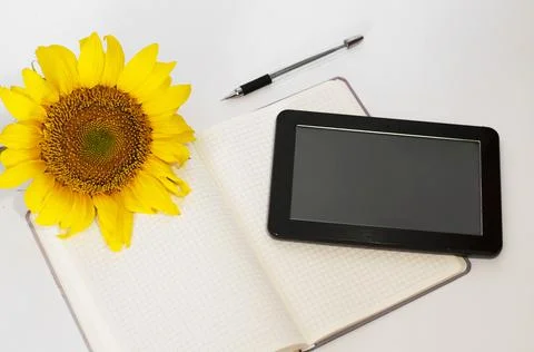 Top view, white desktop notebook with pen for recording and tablet Stock Photos