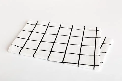 Top view with white empty kitchen napkin isolated on table background. Fold.. Stock Photos