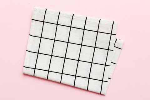 Top view with white empty kitchen napkin isolated on table background. Fold.. Stock Photos