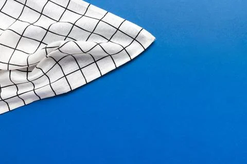 Top view with white empty kitchen napkin isolated on table background. Fold.. Stock Photos
