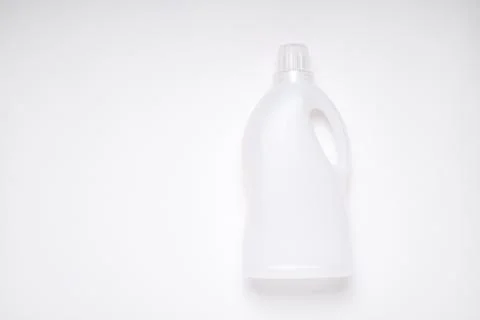 Top view white empty plastic cleaning product bottle on white background with Stock Photos