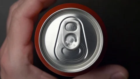 Top view of white man open red can of soda or beer Stock Footage 106742189