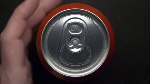Top view of white man open red can of soda or beer Stock Footage 106742293