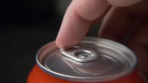 Top view of white man open red can of soda or beer Stock Footage 106742380