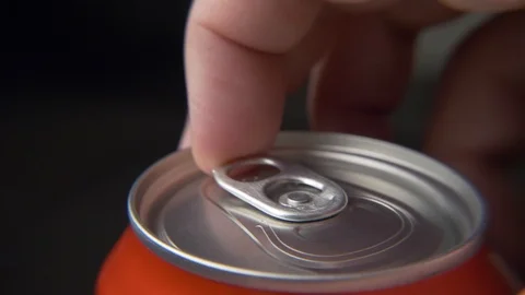 Top view of white man open red can of soda or beer Stock Footage 106742745