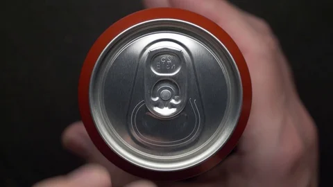 Top view of white man open red can of soda or beer Stock Footage 106743058