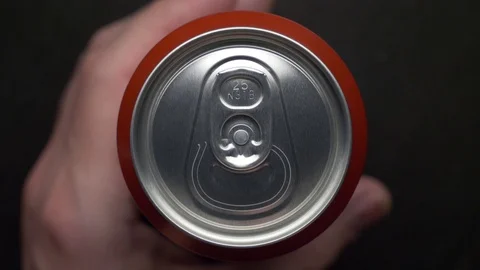 Top view of white man open red can of soda or beer Stock Footage 106743113