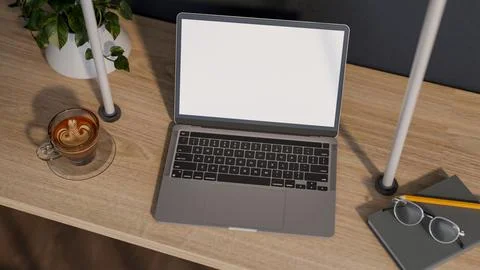 Top view of white screen laptop and coffee with pencil and glasses over boo.. Stock Illustration