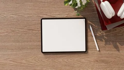 Top view of white screen tablet with stylus and headphones on books aside p.. Stock Illustration