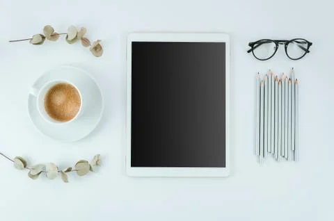 Top view of white tablet with black screen for advertising display or app design Stock Photos