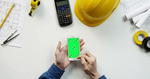 Top view on the white vertical smartphone on the white table of the building 스톡 동영상 96184459