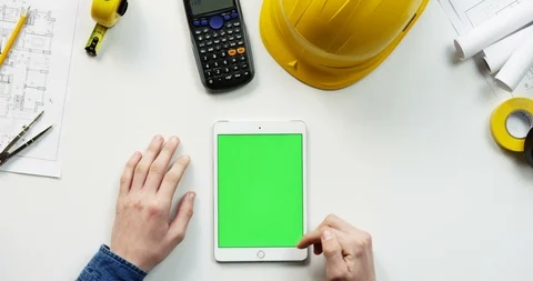 Top view on the white vertical tablet device on the white table of the building Stock-Footage 96184797