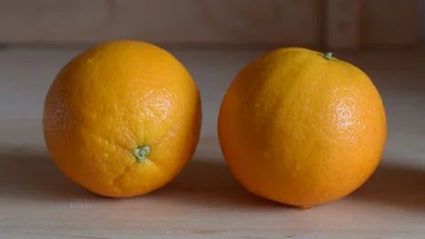 Top view. White wooden table. Heathy.  Fresh juicy oranges are healthy food. Stock Footage 186994470