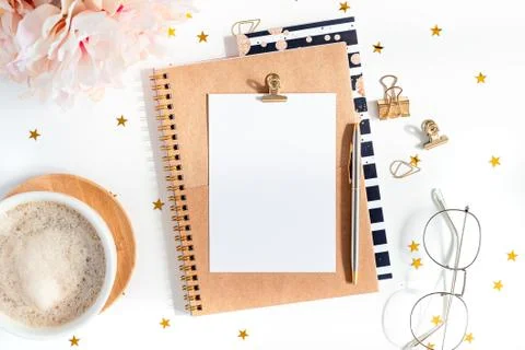 Top view of white working table background with cup of coffee putting on it Stock Photos