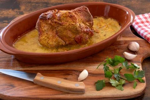 Top view of whole cooked devil's pallet in dish with mustard sauce Stock Photos