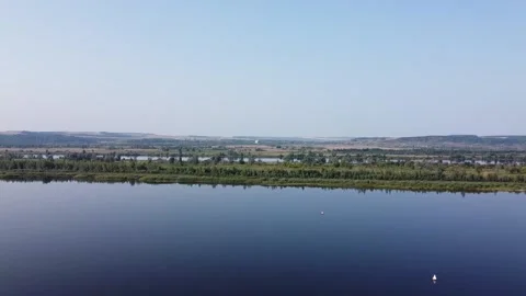 Top view of a wide full-flowing river with islands Stock Footage 143522629