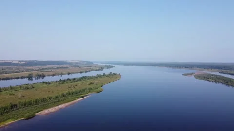 Top view of a wide full-flowing river with islands Stock Footage 143522653