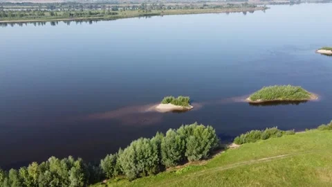Top view of a wide full-flowing river with islands Stock Footage 143522678