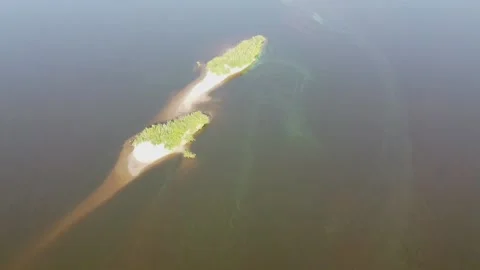 Top view of a wide full-flowing river with islands Stock Footage 143522692