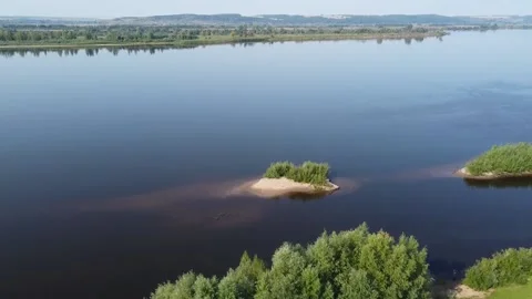 Top view of a wide full-flowing river with islands Stock Footage 143522693