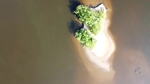 Top view of a wide full-flowing river with islands Stock Footage 143522716