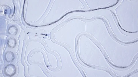 Top view of the winter racing track with driving cars, extreme and dangerous Stock-Footage 128742175