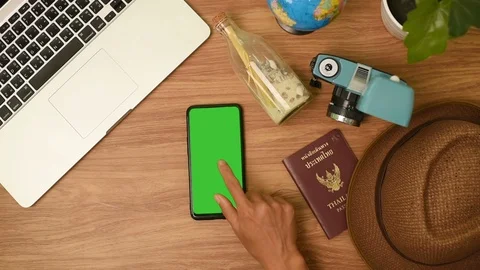 Top view of woman hand using laptop computer with a key green screen set on work Stock Footage 105094002