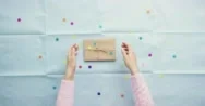 Top View Woman Holding Birthday Present Planning Party Hands From Above Stock Footage