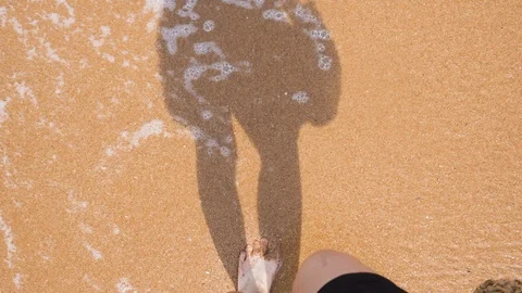 Top view of woman stepping at the sand at sea beach Stock Footage