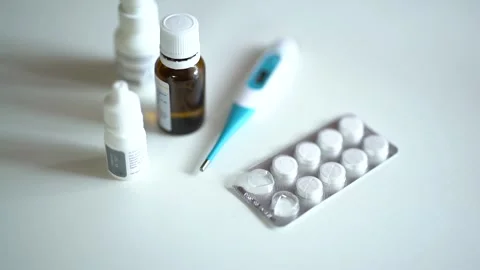 Top view woman's hand takes pills from the table Stock Footage 235471336