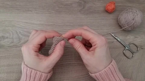 Top view of a womans hands with a hook and thread . Crocheting .Handmade knitted Stock Footage 314788280