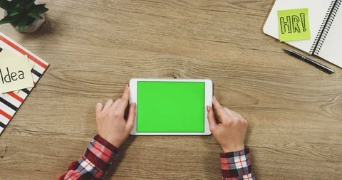 Top view on the woman's hands using the white horizontal tablet device with a Stock Footage 89960207